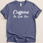 Blue t-shirt with white text "Caffeine Po. Q4h. Prn."