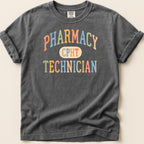 Dark gray t-shirt with "PHARMACY CPHT TECHNICIAN" text in colorful lettering.
