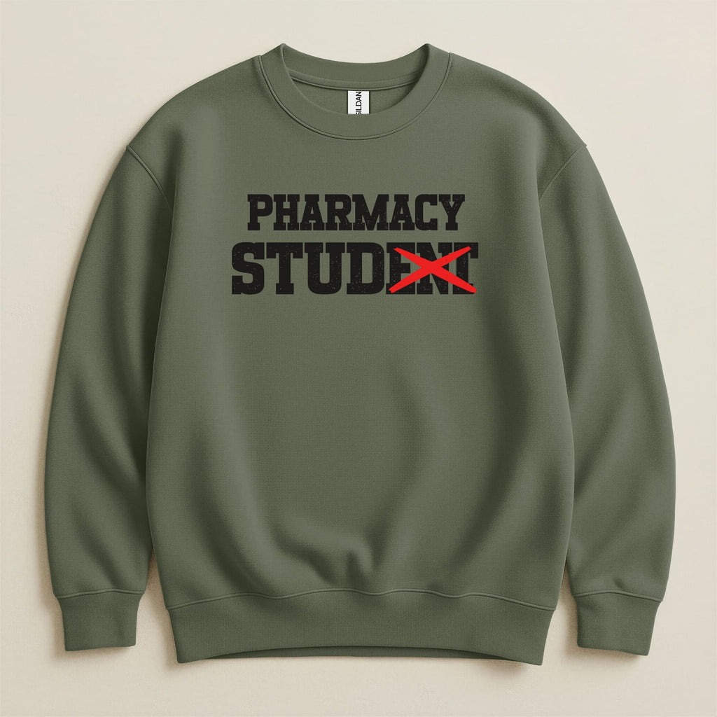 Olive green sweatshirt with "PHARMACY STUDENT" text, red X over "STU".