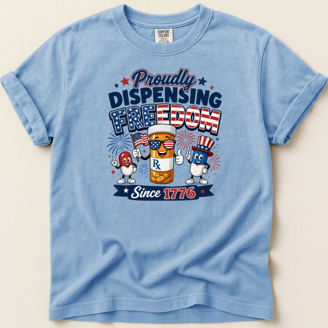 T-shirt with cartoon pills celebrating "Proudly Dispensing Freedom Since 1776".