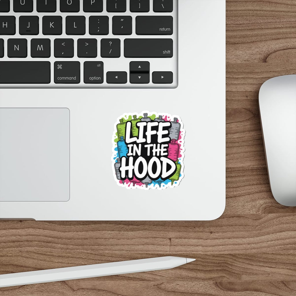 Sticker with "Life in the Hood" text and graffiti spray cans.