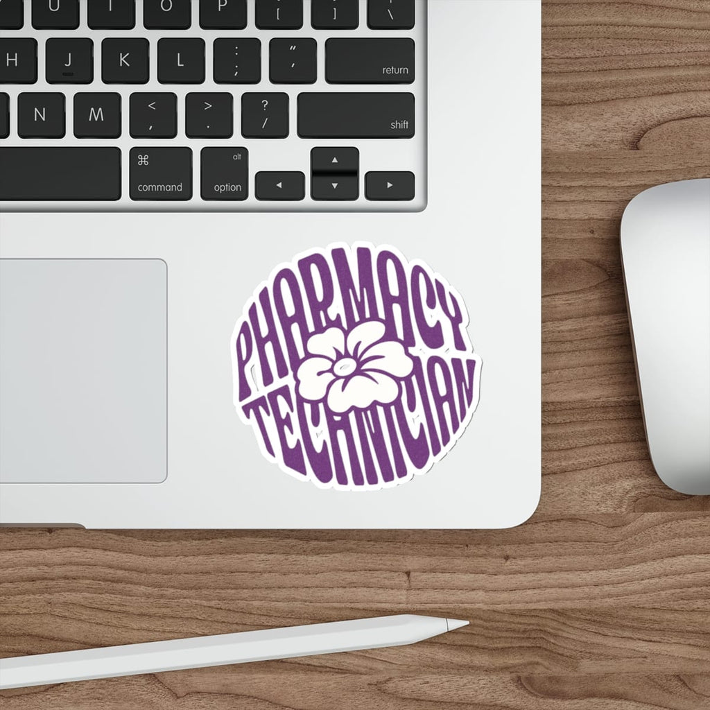 Purple "Pharmacy Technician" text and flower design on a laptop keyboard.
