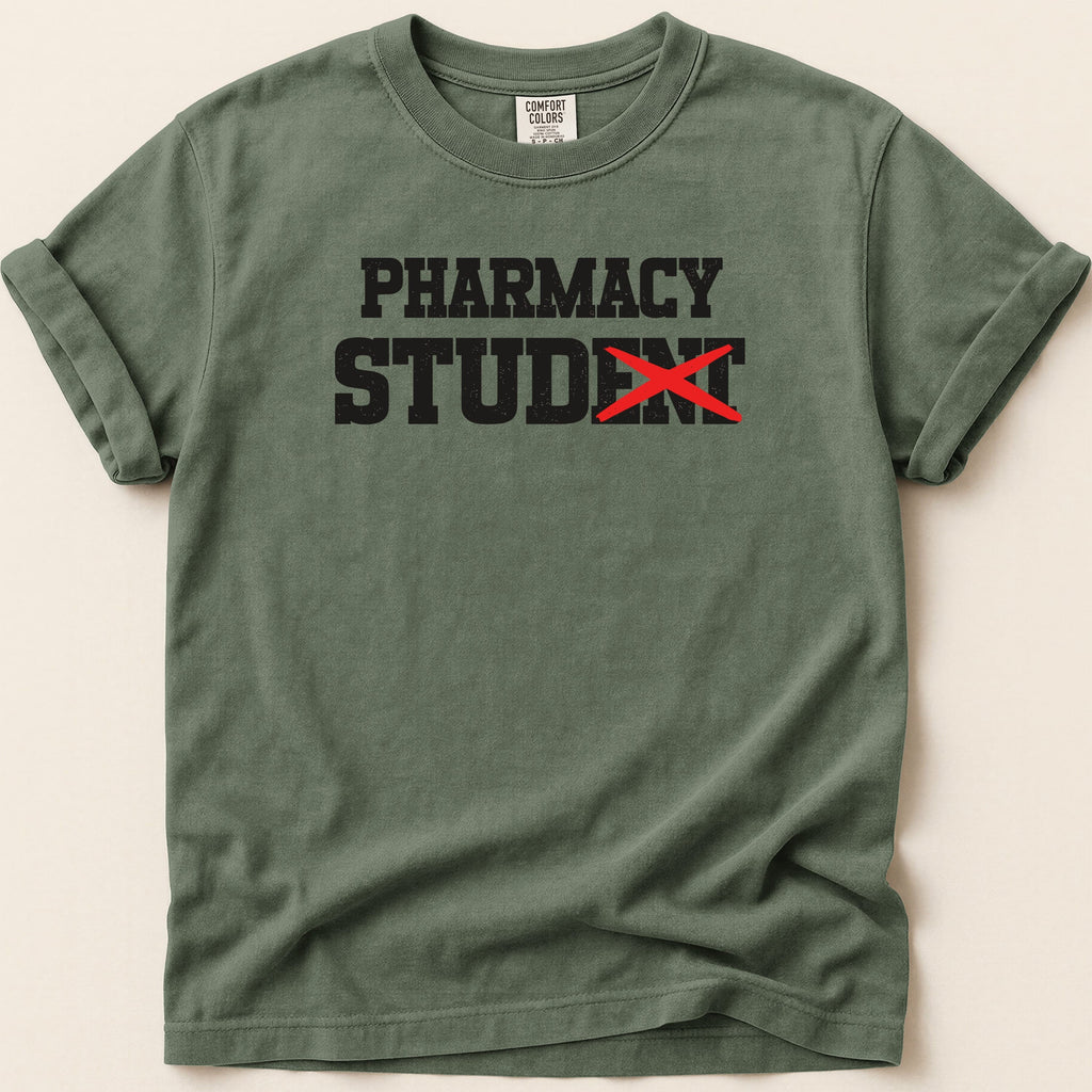 Green t-shirt with "PHARMACY STUDENT" and a red X over "STUDENT".