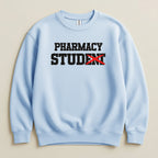 Light blue sweatshirt with "PHARMACY STUDENT" text, the "ENT" is crossed out with red.