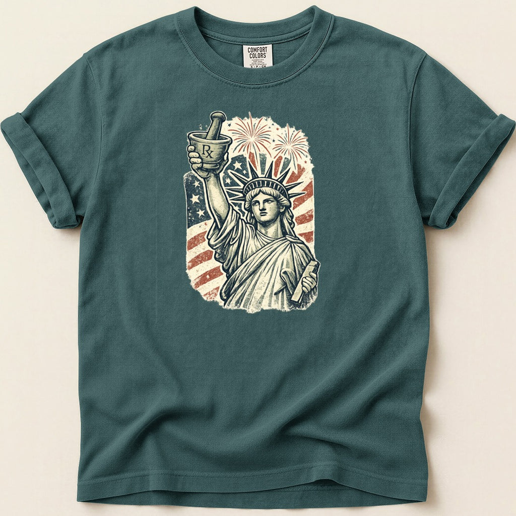 Statue of Liberty holding mortar and pestle with American flag and fireworks.