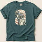 Statue of Liberty holding mortar and pestle with American flag and fireworks.