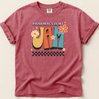 T-shirt with "Pharmacy is My Jam" text and retro floral graphics.