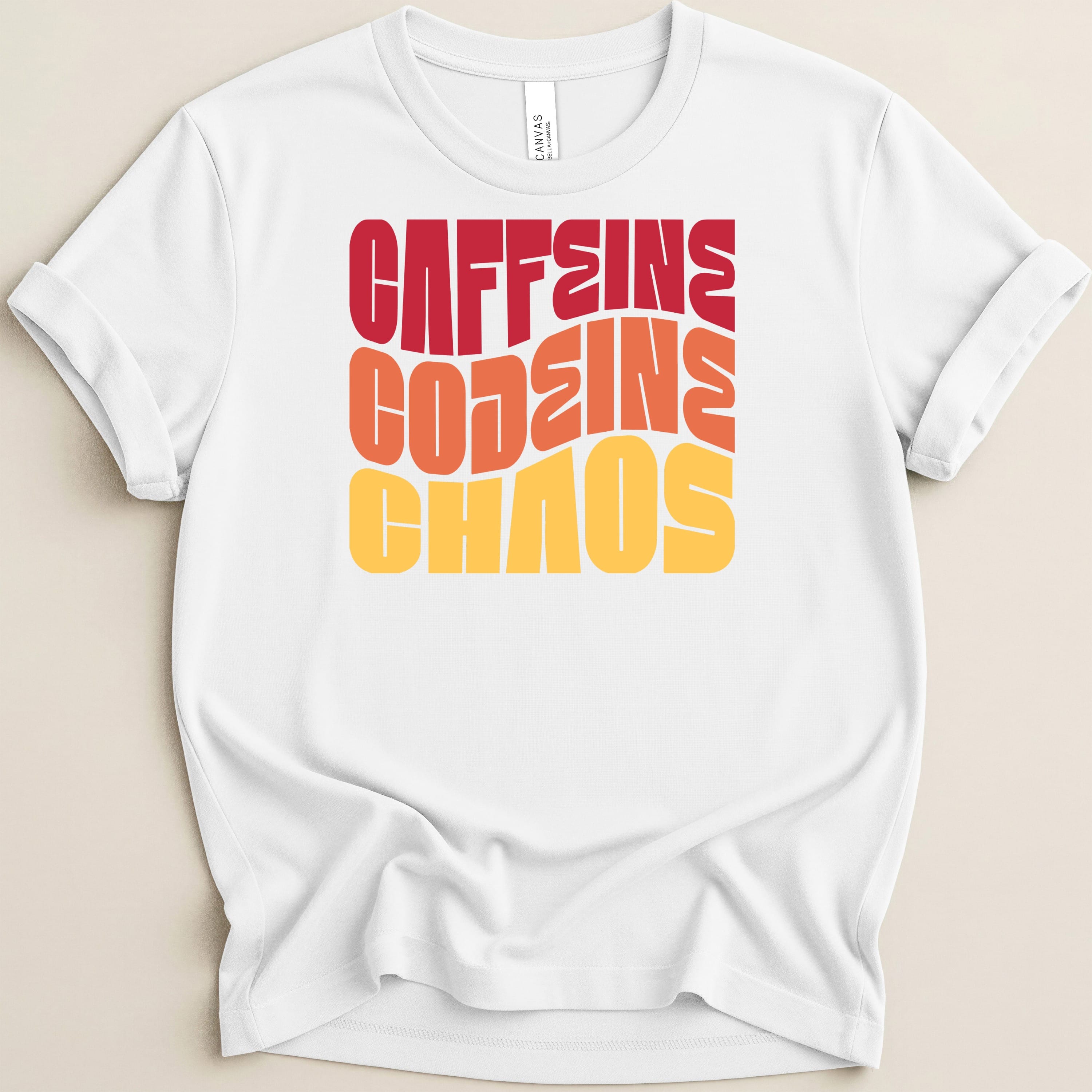 White t-shirt with "CAFFEINE CODEINE CHAOS" in colorful wavy text.