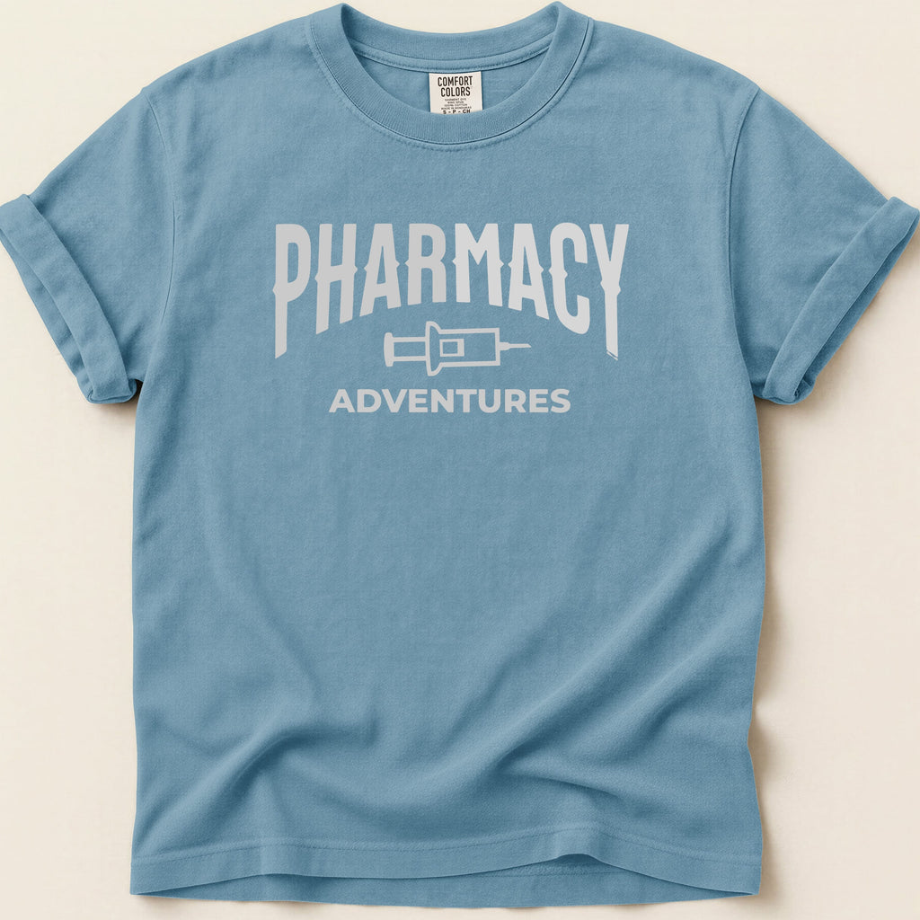 Blue t-shirt with "Pharmacy Adventures" in white text.