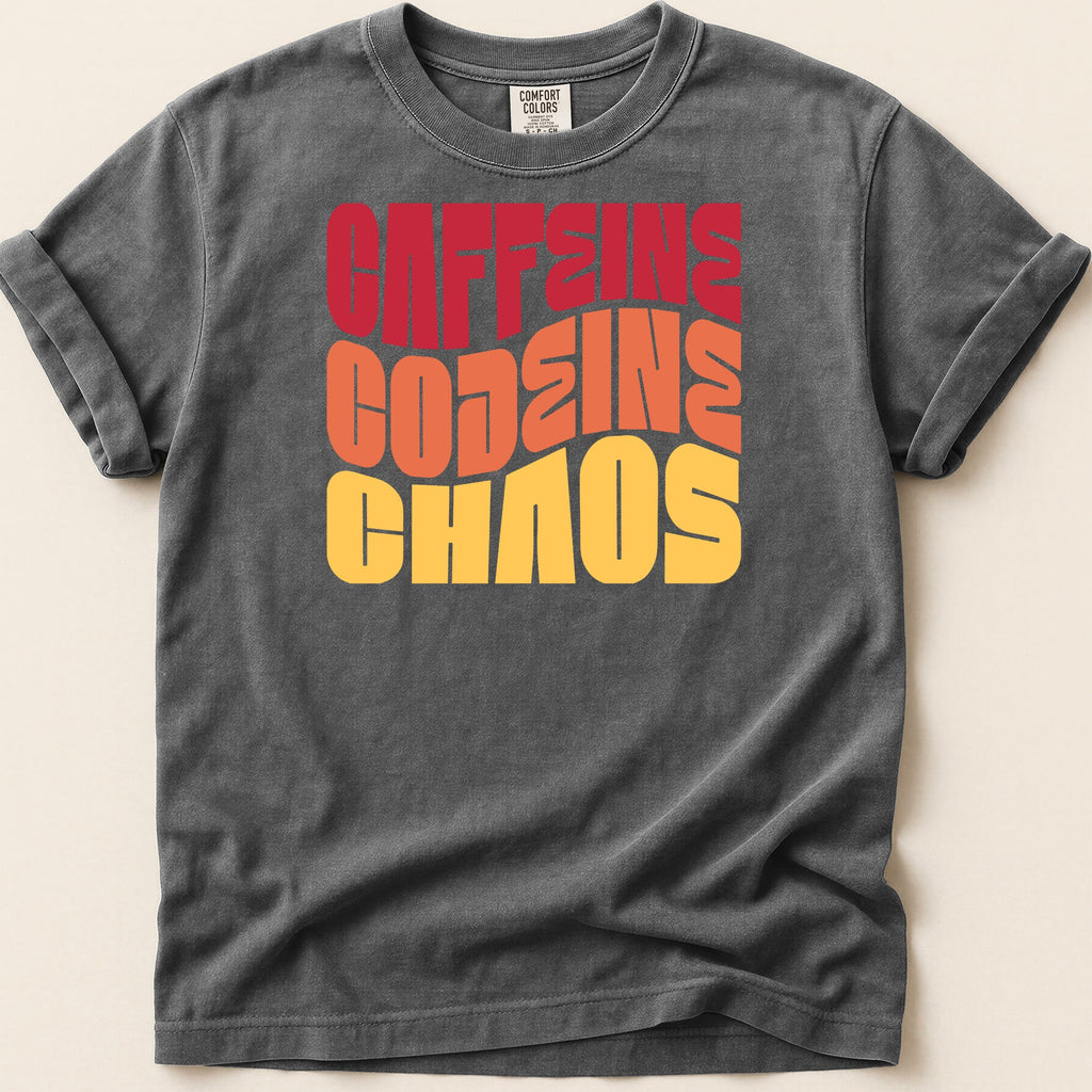 T-shirt with "CAFFEINE CODEINE CHAOS" text in retro, stacked lettering.
