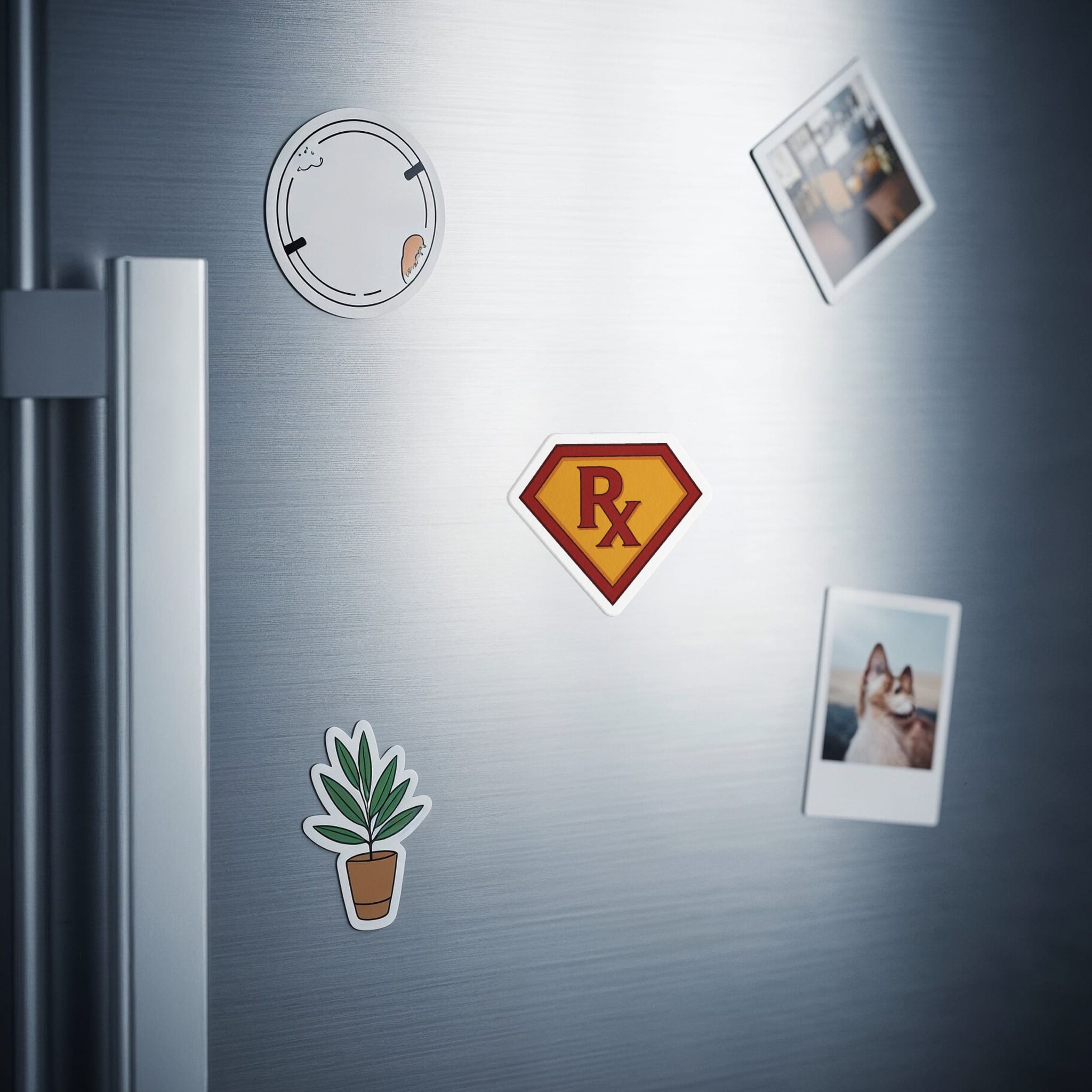 Superman-style 'Rx' logo sticker on a refrigerator door with photos.