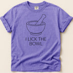 Purple t-shirt with a bowl and pestle graphic and "I LICK THE BOWL" text.