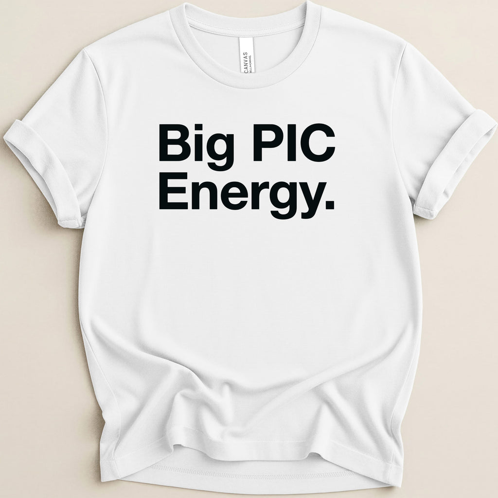 White t-shirt with "Big PIC Energy." text in black.