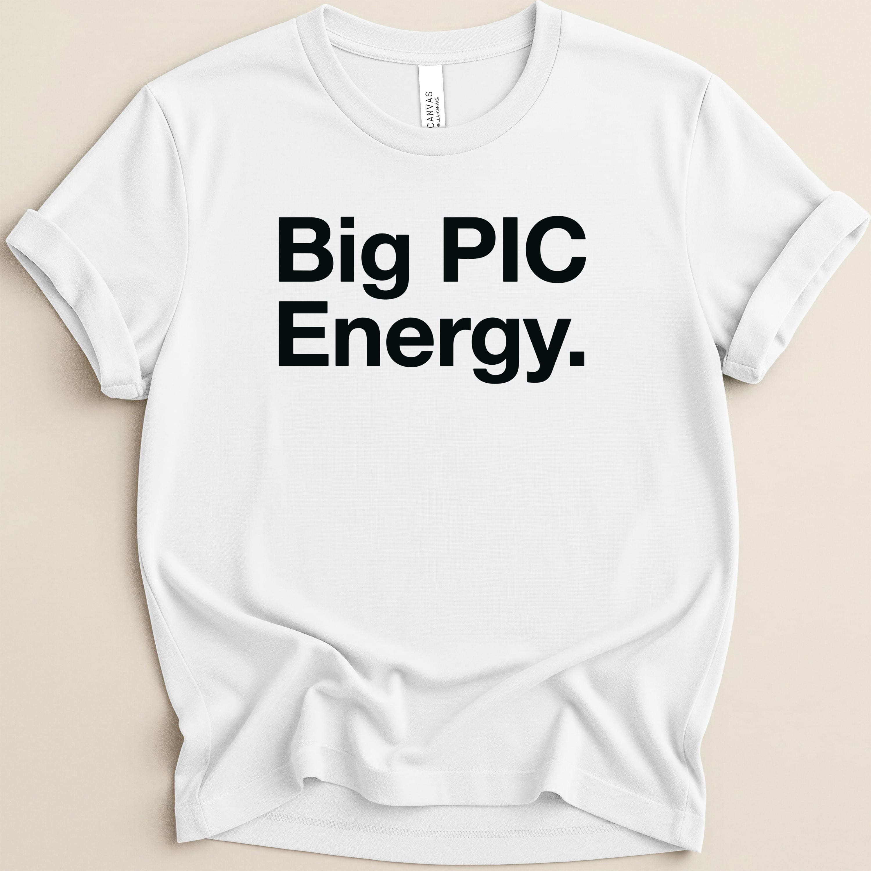 White t-shirt with "Big PIC Energy." text in black.