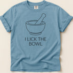 Blue t-shirt with a mortar and pestle graphic and "I lick the bowl" text.