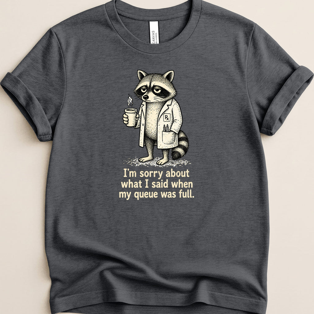 T-shirt featuring a raccoon in a lab coat holding a coffee cup with text.