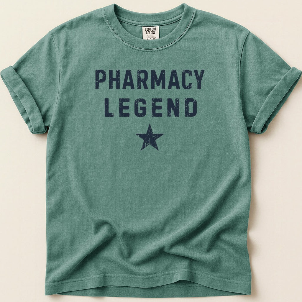 Green t-shirt with "PHARMACY LEGEND" and a star in navy blue.