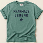 Green t-shirt with "PHARMACY LEGEND" and a star in navy blue.