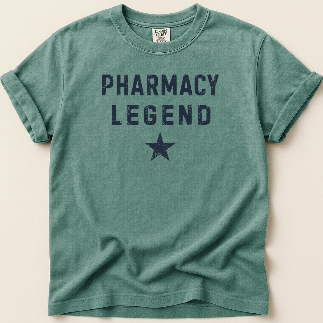 Green t-shirt with "PHARMACY LEGEND" and a star in navy blue.