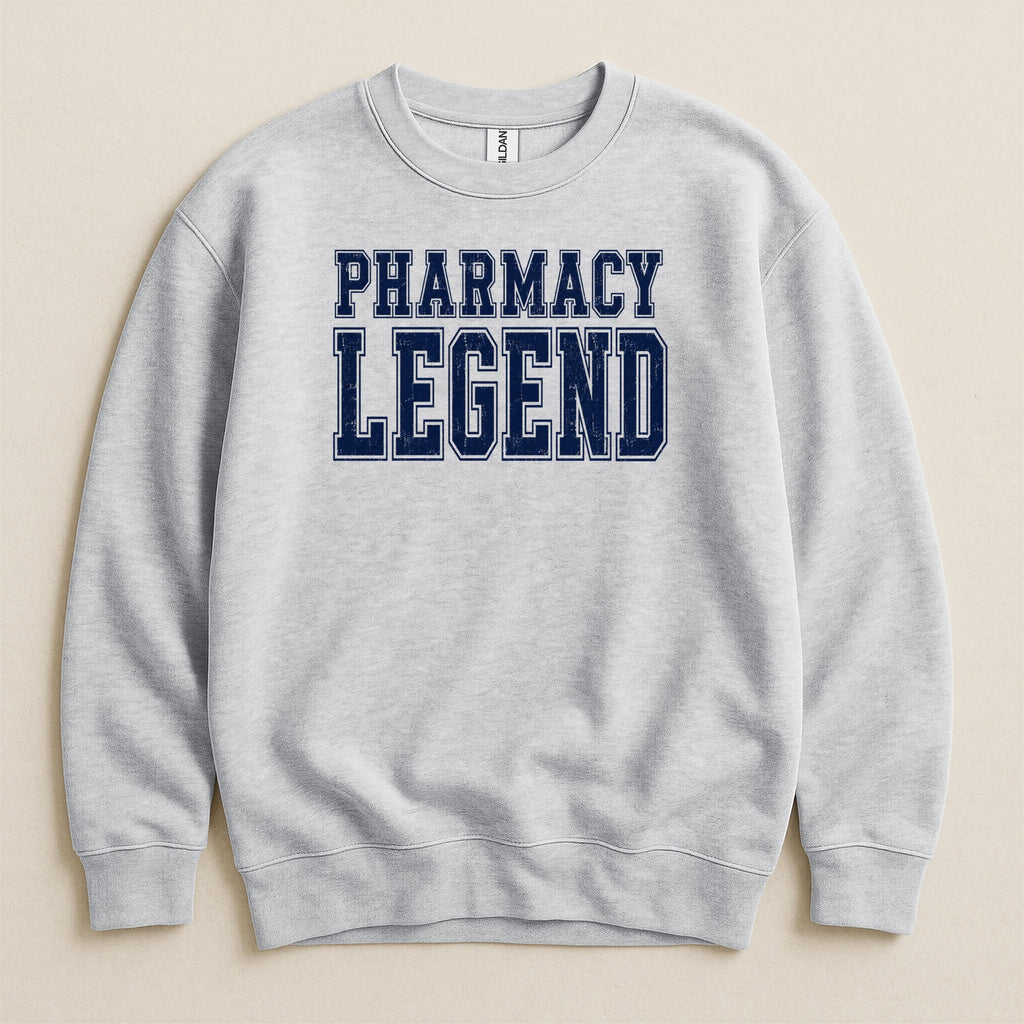 Light grey sweatshirt with navy blue "PHARMACY LEGEND" text.