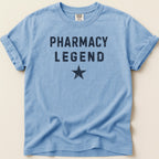 Light blue t-shirt with "PHARMACY LEGEND" and a star.