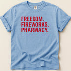 Blue t-shirt with red text reading "FREEDOM. FIREWORKS. PHARMACY."