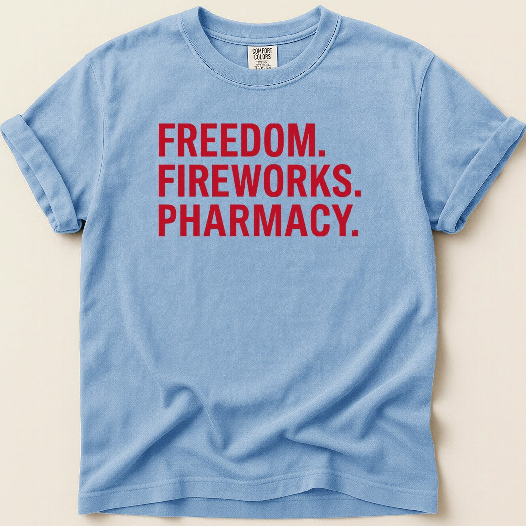 Blue t-shirt with red text reading "FREEDOM. FIREWORKS. PHARMACY."