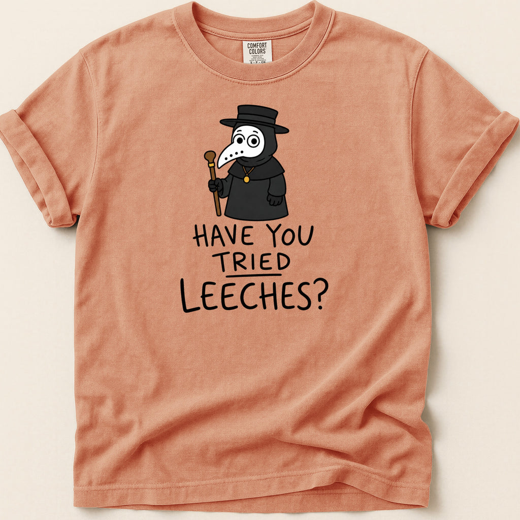 T-shirt with a cartoon plague doctor graphic and text "HAVE YOU TRIED LEECHES?".