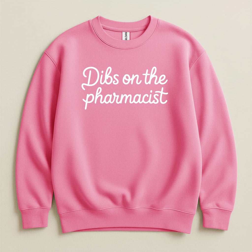Pink sweatshirt with "Dibs on the pharmacist" text.