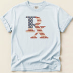 Distressed American flag Rx symbol on a light blue t-shirt.