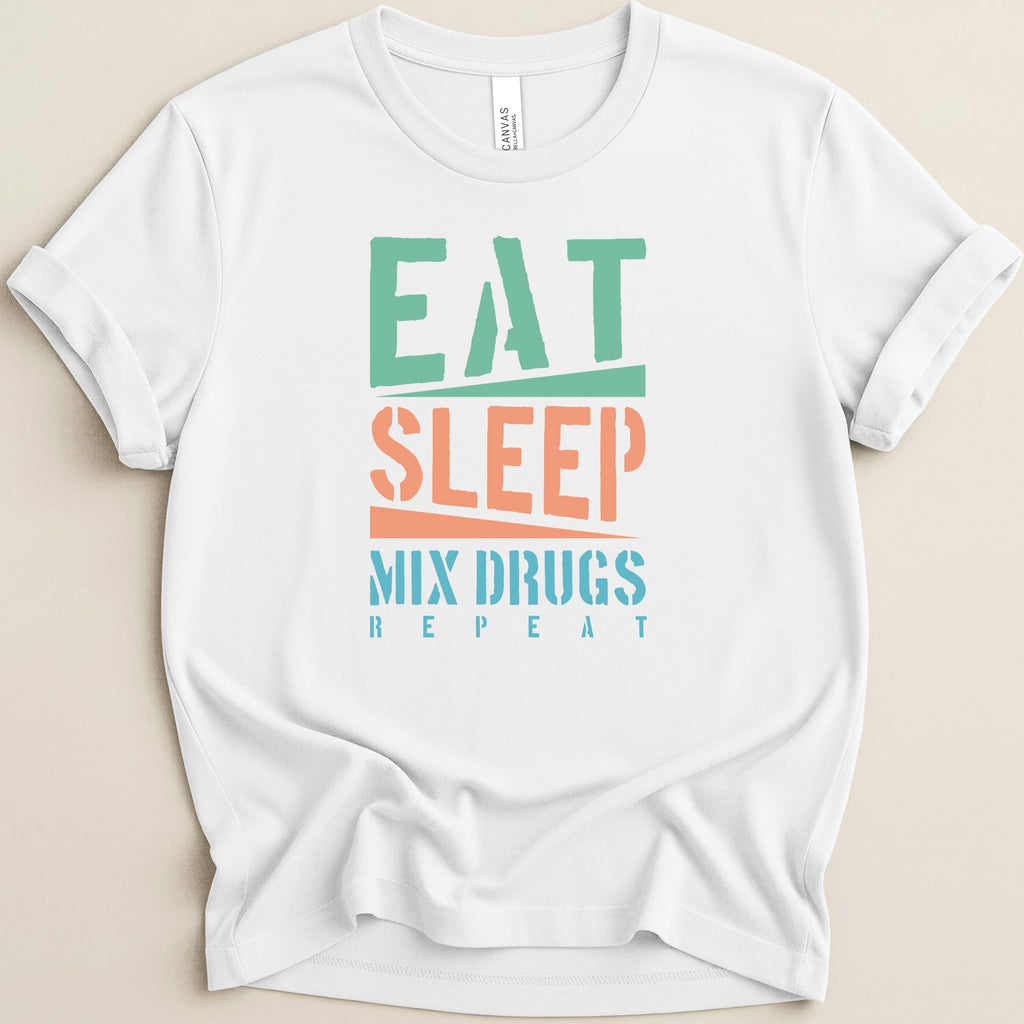 White t-shirt with "Eat Sleep Mix Drugs Repeat" text in green, orange, and blue.