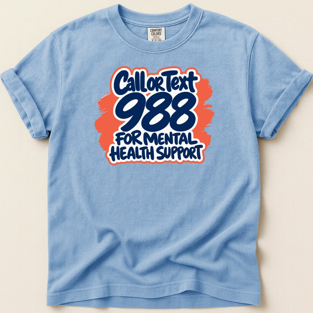 Light blue t-shirt with "Call or Text 988 for Mental Health Support" graphic.