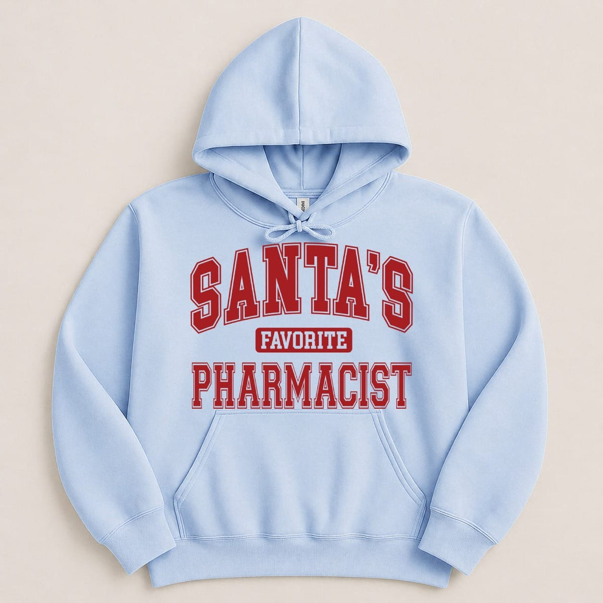 Light blue hooded sweatshirt with red collegiate lettering on the chest reading Santa's Favorite Pharmacist.