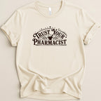 Cream t-shirt with "Trust Your Pharmacist" text and star accents.