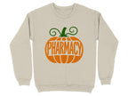 Cream sweatshirt with an orange pumpkin design and the word "Pharmacy".