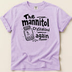 Purple t-shirt with "The mannitol Crystalized again" text and prescription bottle graphic.