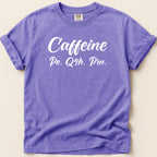 Purple t-shirt with "Caffeine Po. Q4h. Prn." text.