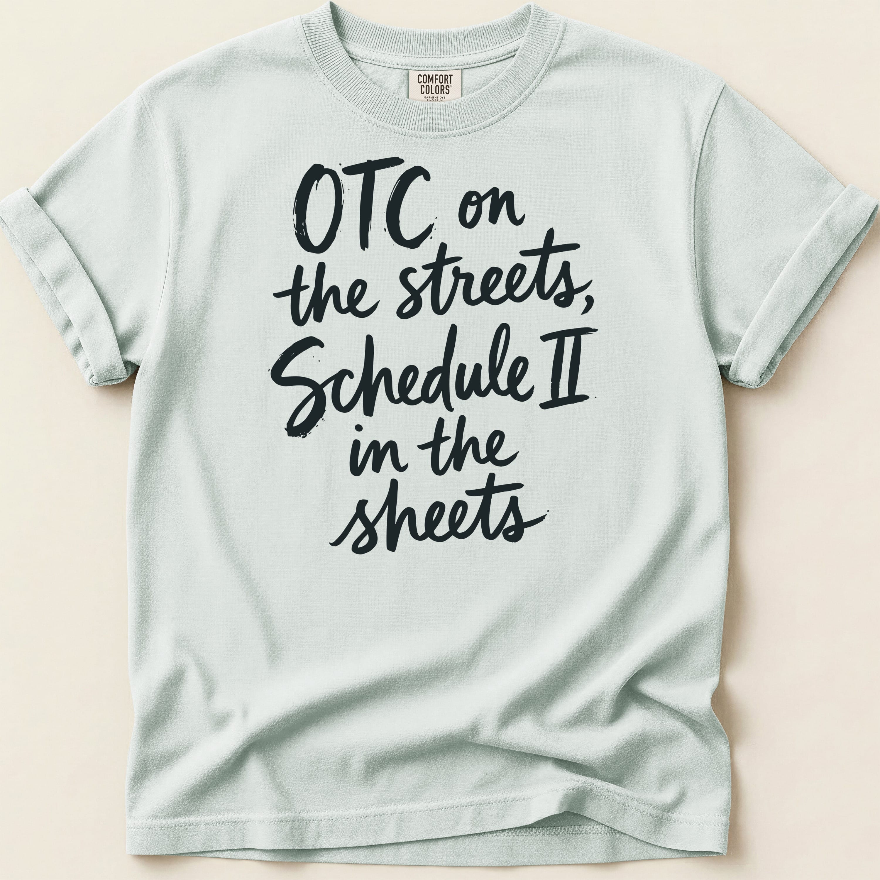 Comfort Colors t-shirt with "OTC on the streets, Schedule II in the sheets" text.