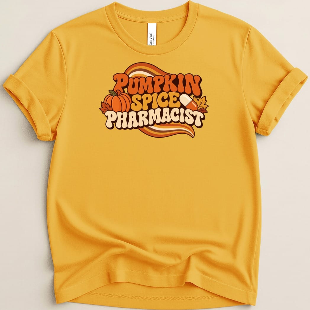 Golden yellow crewneck t-shirt featuring a retro graphic with the text PUMPKIN SPICE PHARMACIST alongside a pumpkin and pill capsule.