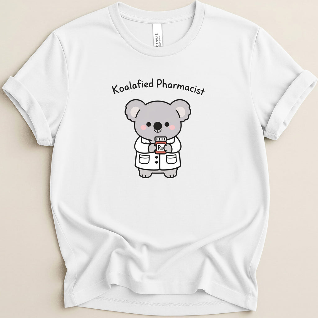 White t-shirt with cartoon koala pharmacist holding a prescription bottle.