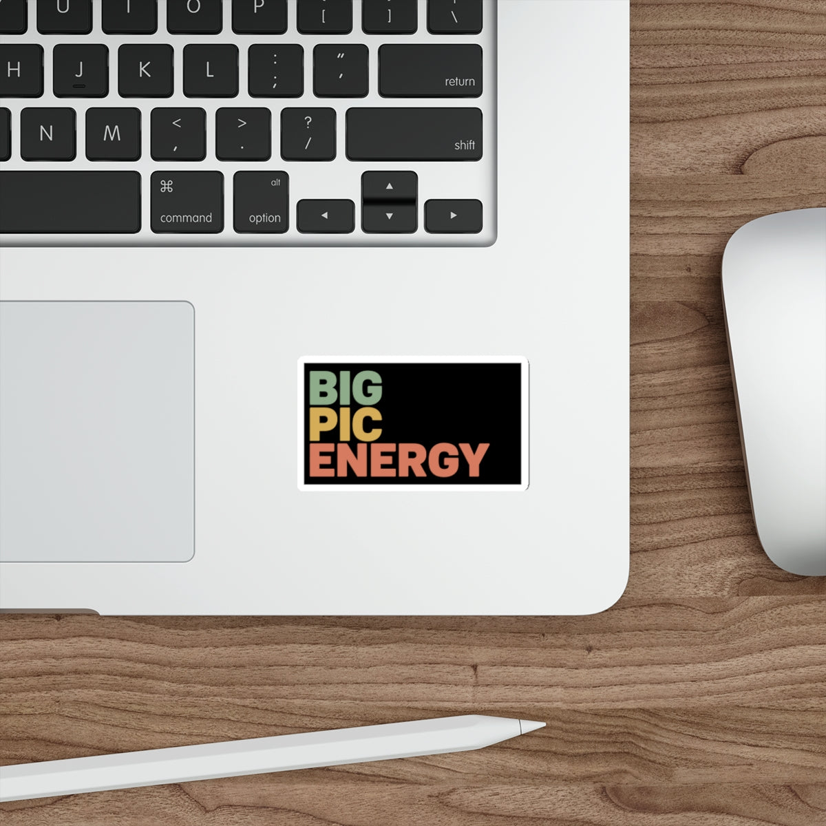 Sticker with "BIG PIC ENERGY" in colorful block letters on a laptop.