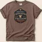 Brown t-shirt with "Proudly Dispensing Freedom Since 1776" emblem.