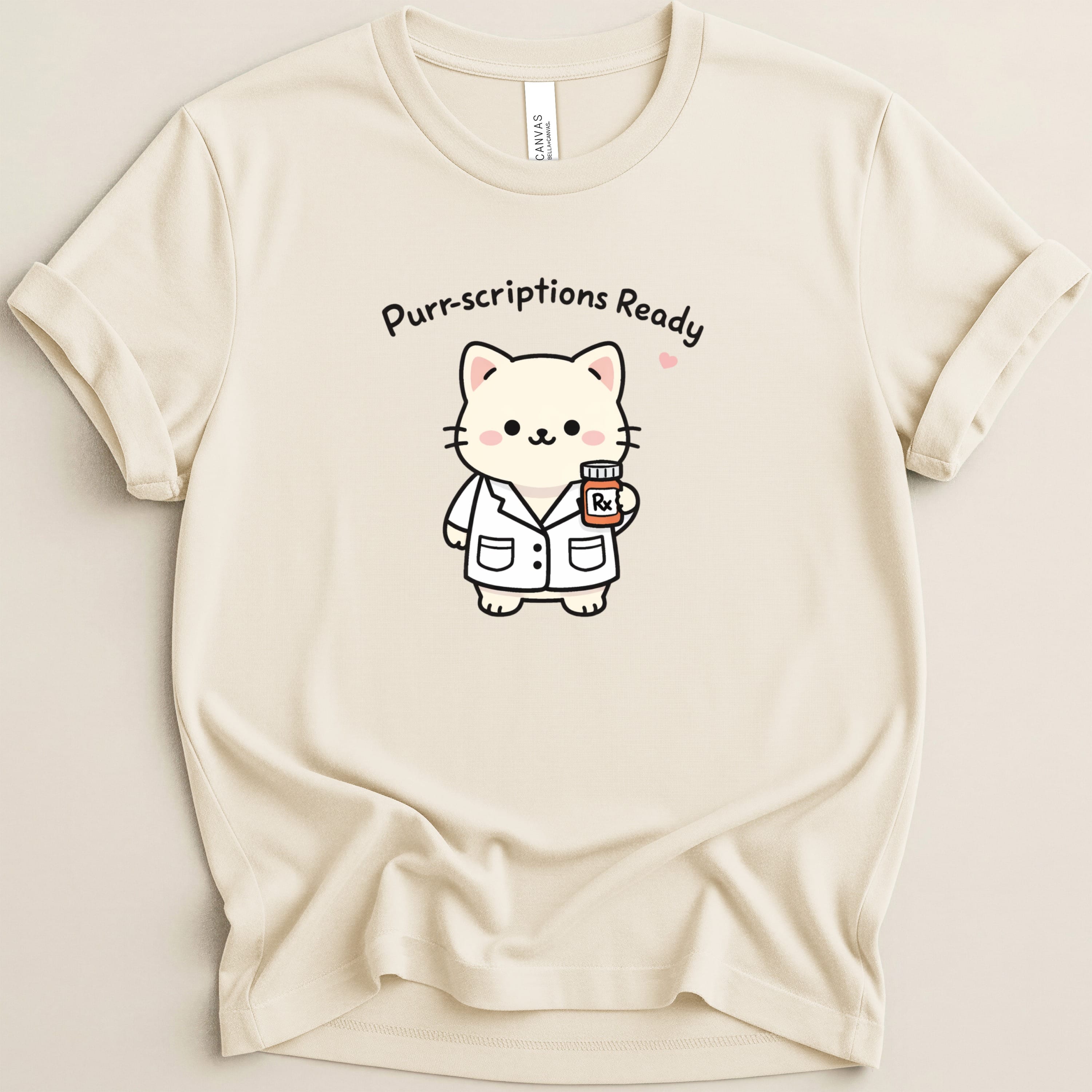 T-shirt with a cartoon cat wearing a lab coat holding a prescription bottle.