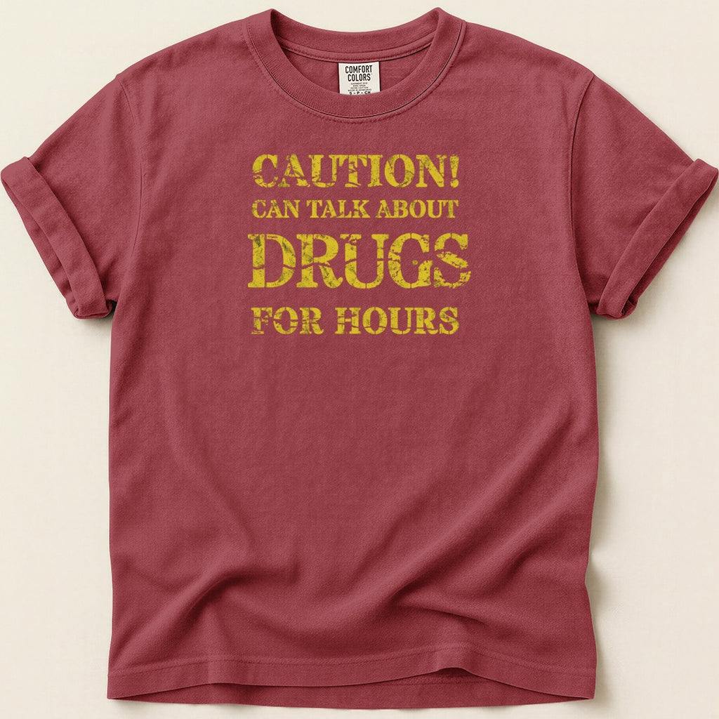 Crimson t-shirt with yellow distressed text "Caution! Can Talk About Drugs For Hours".