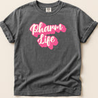 Comfort Colors dark grey t-shirt with pink "Pharm Life" text.