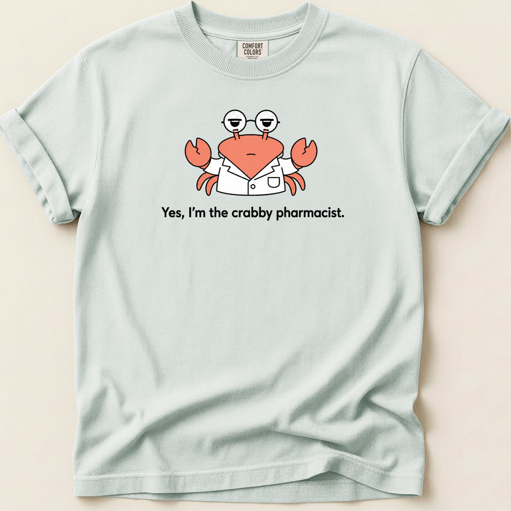 Crab wearing glasses and lab coat with text "Yes, I'm the crabby pharmacist."
