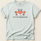 Crab wearing glasses and lab coat with text "Yes, I'm the crabby pharmacist."