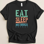 Black t-shirt with "Eat Sleep Mix Drugs Repeat" text.
