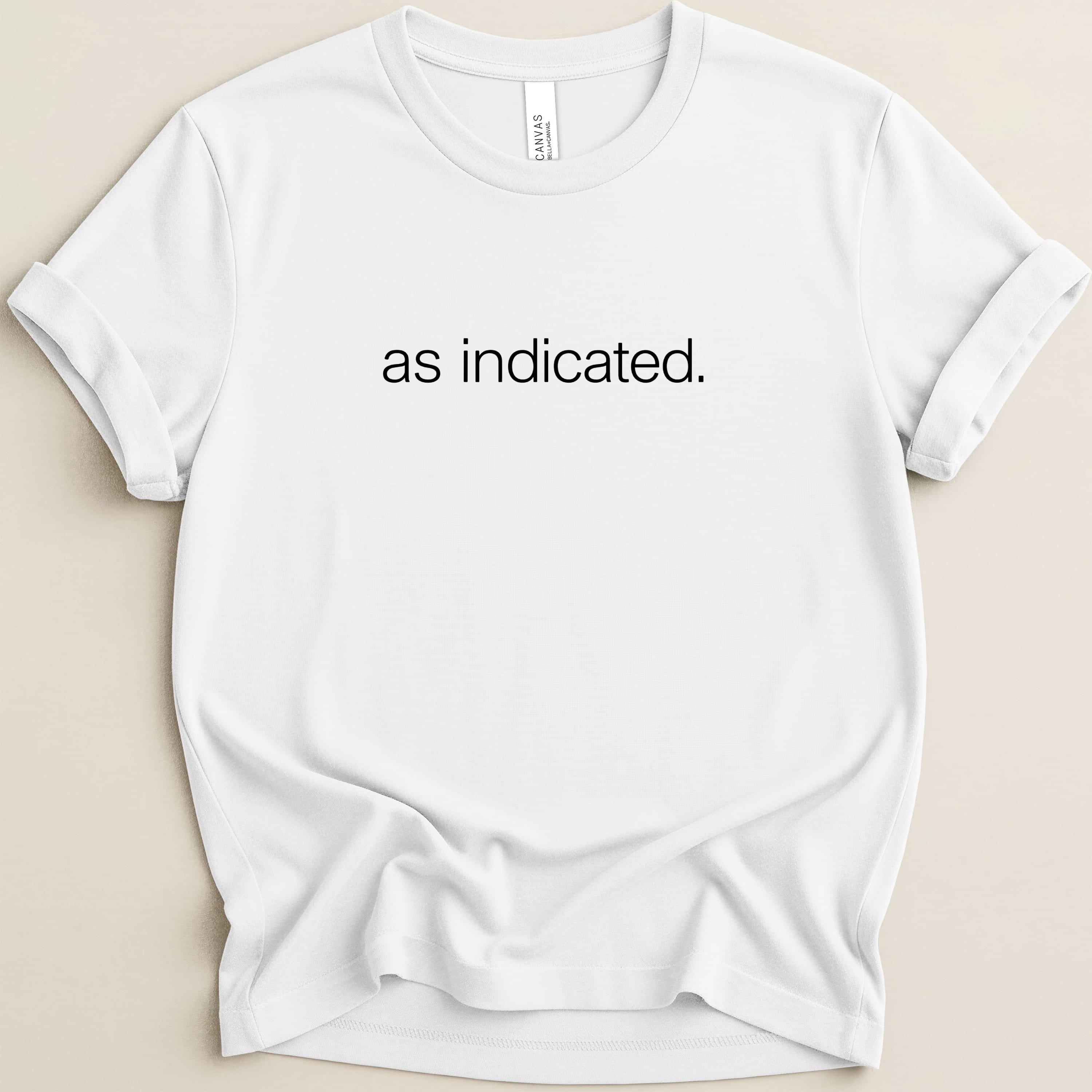 White t-shirt with "as indicated." printed in black text.
