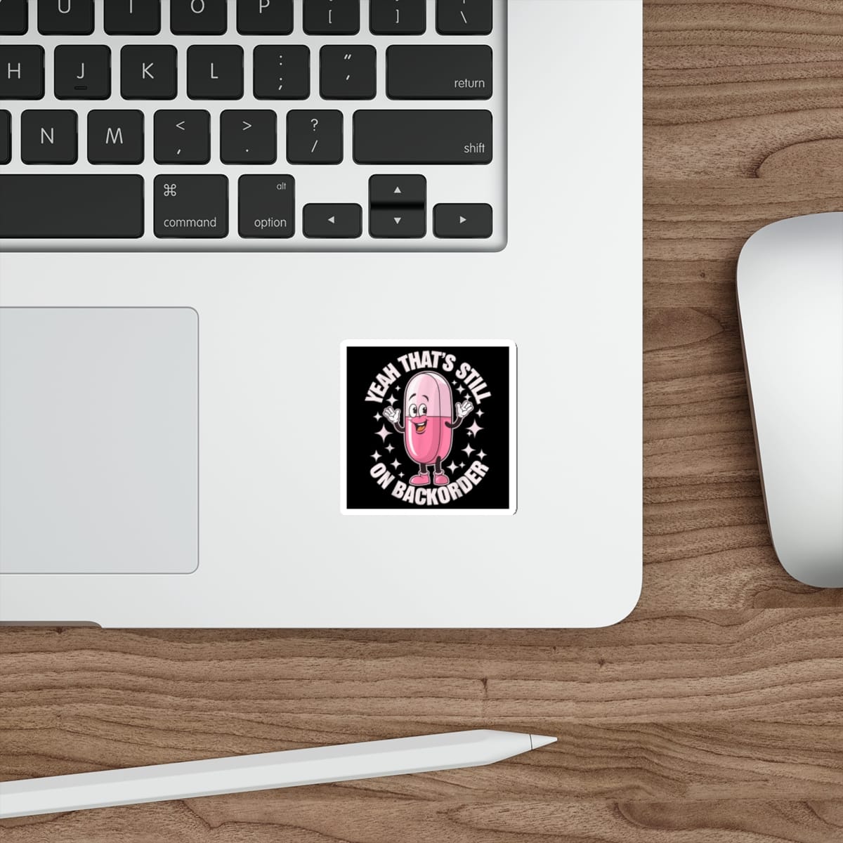 Sticker of a pink pill with "Yeah that's still on backorder" text.